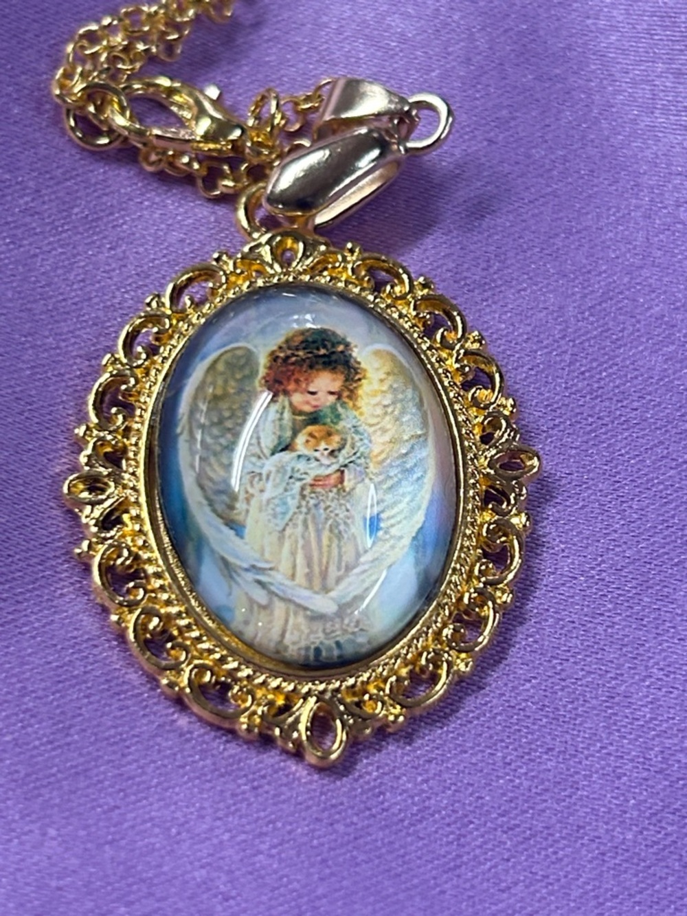 Gold Angel 1.5”x 1” Pendant Necklace with Blue and White Motif - Unbranded